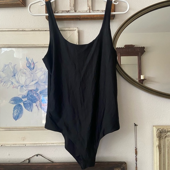 It’s now cool black cheeky bathing suit - Picture 2 of 4